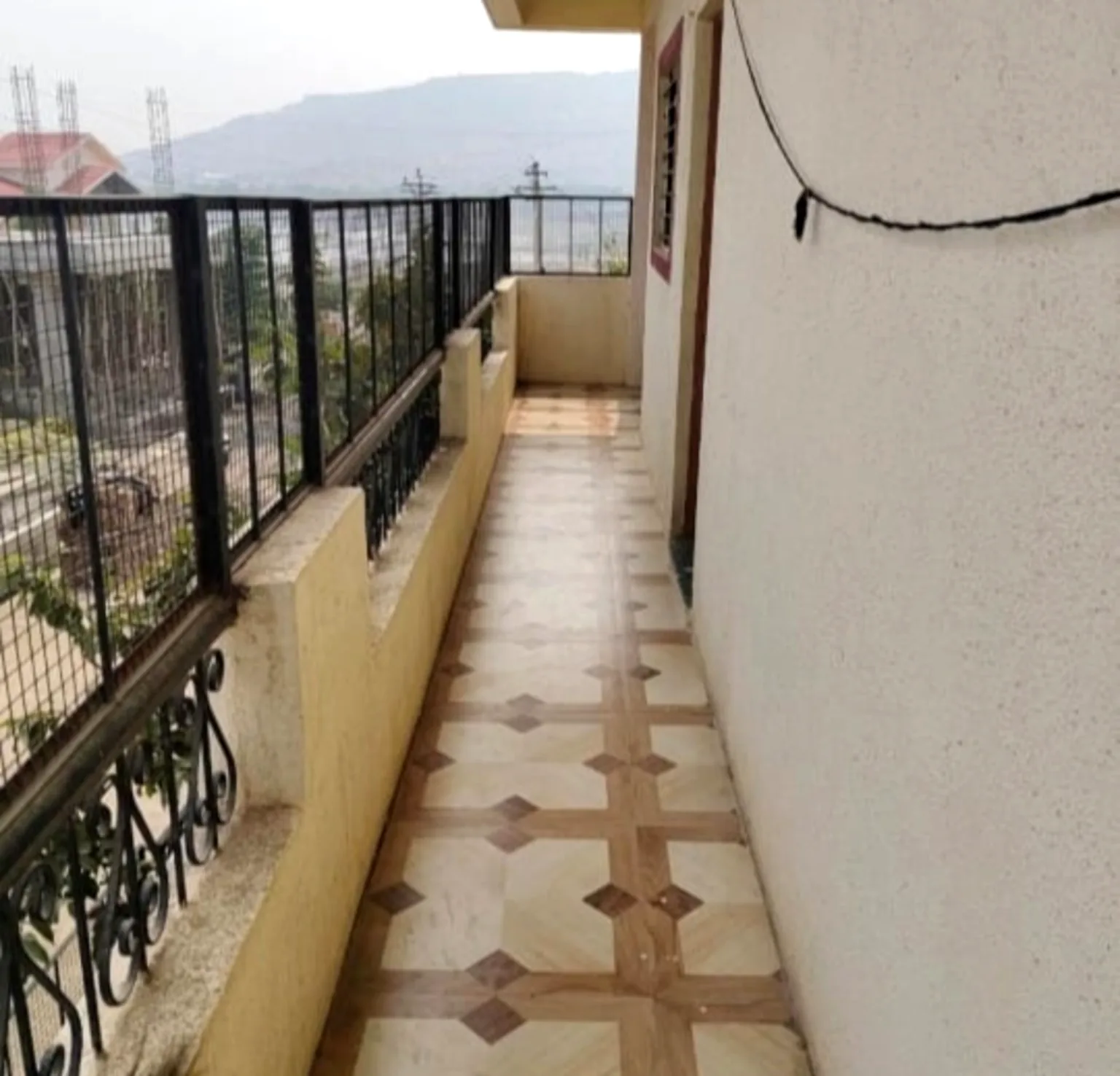 Balcony area at Atithi Niwas Jejuri for pilgrims and family stay